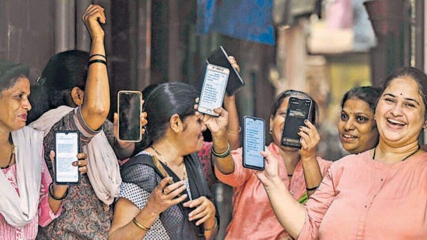 Women express happiness over the deposit of  <span class='webrupee'>₹</span>3,000 in their accounts under the Maharashtra Government's Ladki Bahin Yojana on August 16, 2024.
