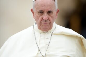 Ailing Pope Francis works on signature reform from hospital as he recovers