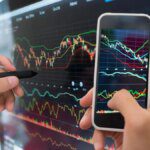 Banking stocks lift markets higher in midday trade 