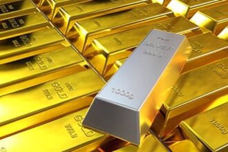 Gold declines ₹612 on strong dollar, weak global cues after Fed move
