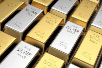 Gold, silver futures retreat from record highs on profit booking as Fed rate decision looms