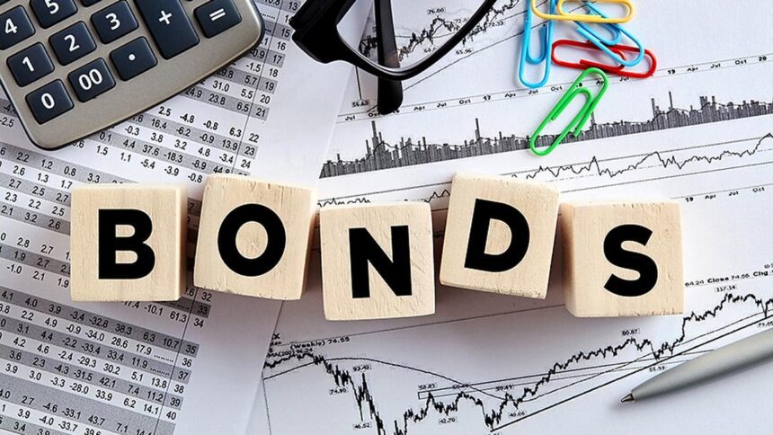 India bond yields inch down on quarter-end buying; RBI policy key