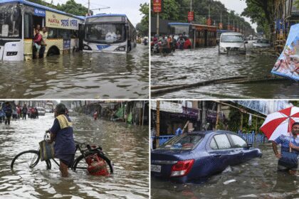 Kolkata flooded: Pandals submerged, streets underwater, cars stranded - videos show havoc