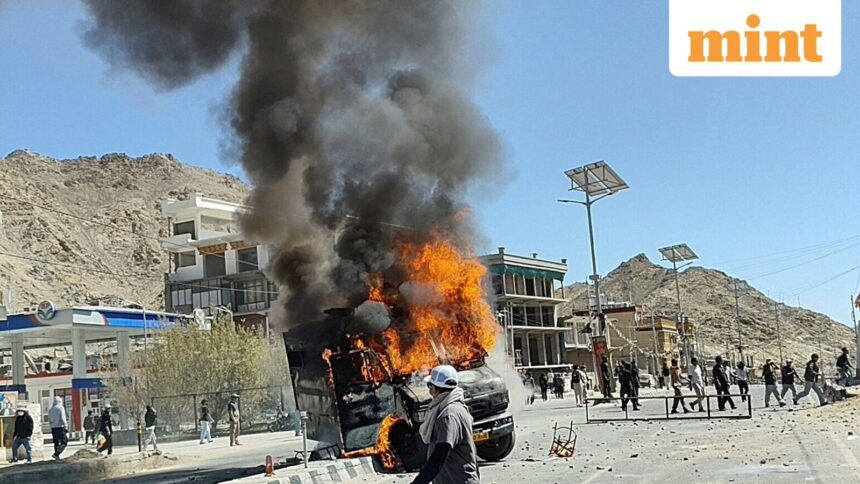 Ladakh Protests Highlights: A vehicle is set on fire during a protest by locals demanding statehood for the federal territory and job quotas for local residents in Leh, in the Ladakh region, India, September 24, 2025. REUTERS/Stringer