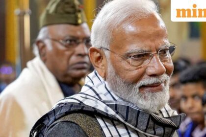 Prime Minister Narendra Modi and Congress chief Mallikarjun Kharge (in the background)