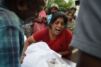 Crowd crush at political rally in southern India kills 39 people