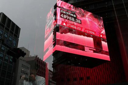 Japan's Nikkei reverses early loss on report of new government stimulus