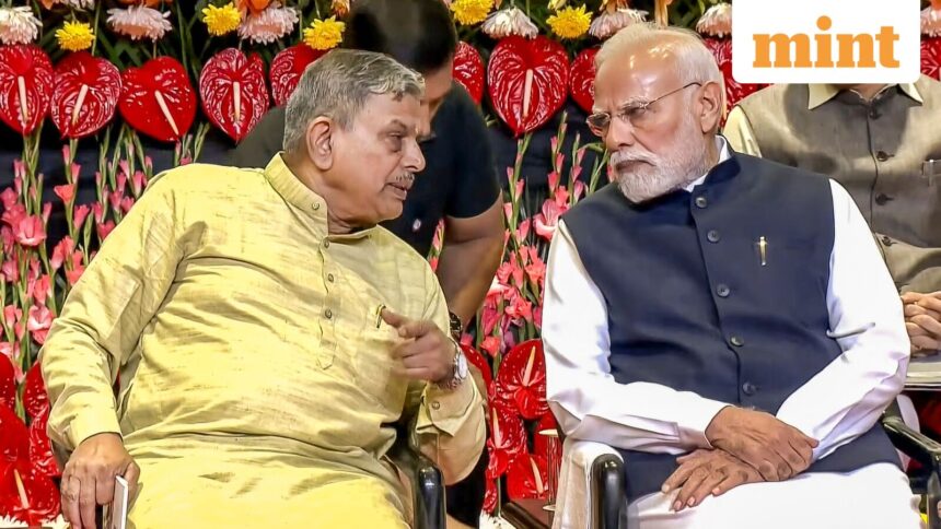 Prime Minister Narendra Modi and RSS Sarkaryavah Dattatreya Hosabale during the centenary celebrations of the Rashtriya Swayamsevak Sangh (RSS) at Dr Ambedkar International Centre in New Delhi.