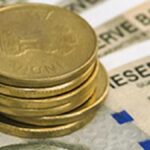 Rupee spurts 14 paise to 87.88 against US dollar in early trade