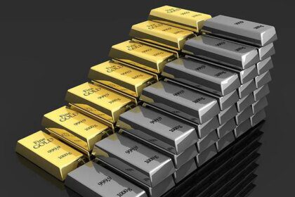 Gold, silver futures drop as Fed minutes, strong dollar weigh on safe-haven assets