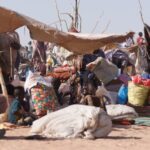 Tens of thousands flee on foot amid mass atrocities in Sudan’s El Fasher