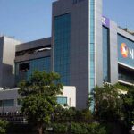 NSE net down 33% on one-time provision