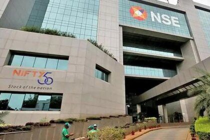 Nifty hovers near record high as banking stocks power rally
