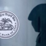 RBI boosts dollar shorts to rein in rupee slide