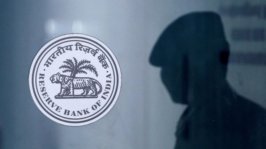 RBI boosts dollar shorts to rein in rupee slide