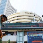 Sensex, Nifty hit fresh peaks after 14 months on financial sector rally