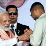 Patna, Nov 20 (ANI): Newly sworn-in Bihar Minister Deepak Prakash greets Prime Minister Narendra Modi during the swearing-in ceremony, in Patna on Thursday. (ANI Photo)