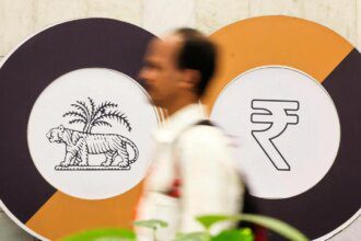 RBI rate cut lifts markets; Sensex surges 447 points as banking stocks rally