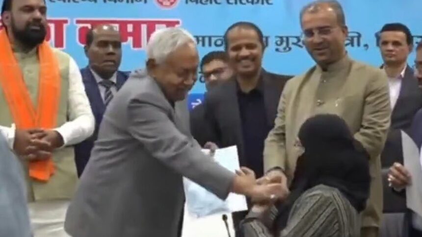 Video shows CM Nitish Kumar removing woman’s hijab in public, RJD asks if he has become “100% sanghi”?