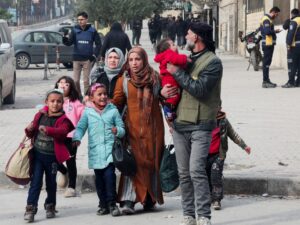 Photos: Civilians flee Aleppo amid intensified fighting
