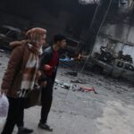 Syrians in Kurdish areas of Aleppo pick up pieces after clashes