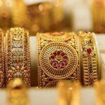 Gold edges down with US-Iran talks, central bank decisions in focus