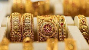 Gold edges down with US-Iran talks, central bank decisions in focus