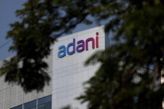 Adani Enterprises posts flat EBITDA, Q4 loss on depreciation hit; stock slips