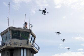 a column of drones in the sky