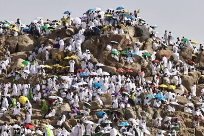 Hajj pilgrims gather at Mount Arafat under scorching desert sun