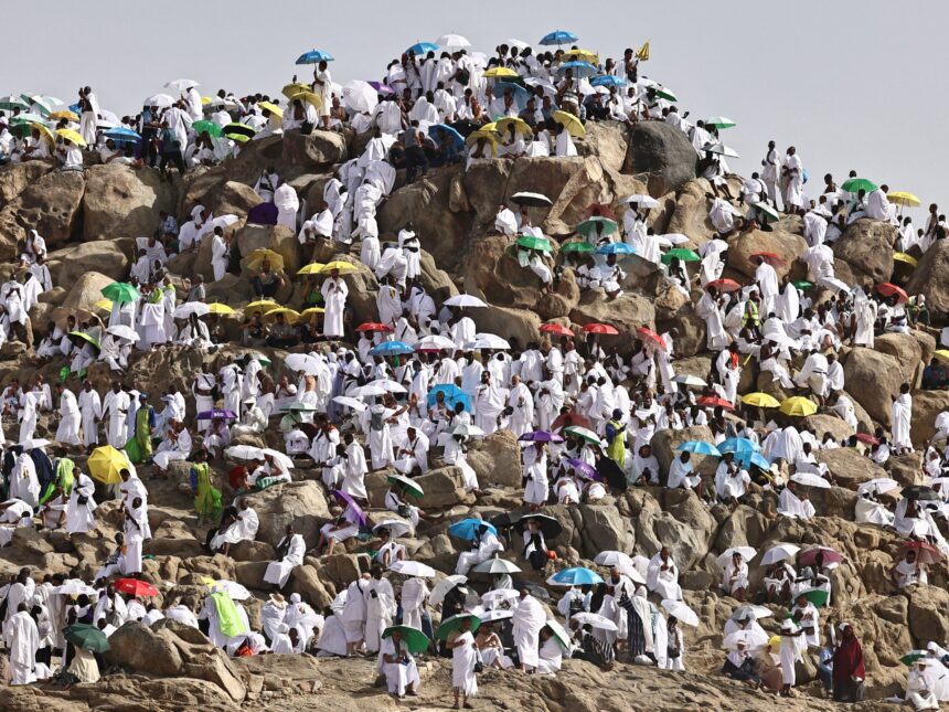Hajj pilgrims gather at Mount Arafat under scorching desert sun