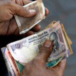 Rupee shored up by firm RBI intervention but oil risks linger