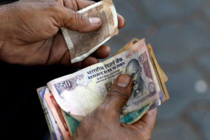 Rupee shored up by firm RBI intervention but oil risks linger