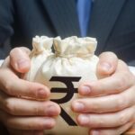 Rupee edges closer to 96/USD; end at a record low of 95.71