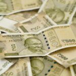 India's BoP outlook improves, INR depreciation pressure to ease: Goldman Sachs