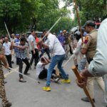 Photos: Police fire tear gas at India’s Cockroach movement supporters