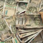 Rupee falls 13 paise to settle at 95.43 against US dollar