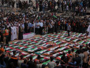 Photos: Thousands in Gaza City join mass funeral for 112 Palestinians