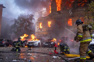 Photos: Russian drone strikes pound civilian targets across Kyiv
