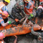 Photos: UN urges global aid after China, Nepal floods kill over 1,300