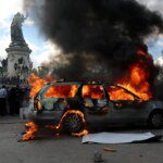 Photos: Protests across France spiral into looting, blazes and clashes