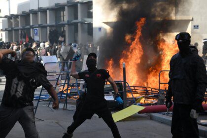 Photos: School blockades, street protests grip France
