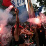 ‘No to the father, no to the son’: Thousands march in Rio against Bolsonaro